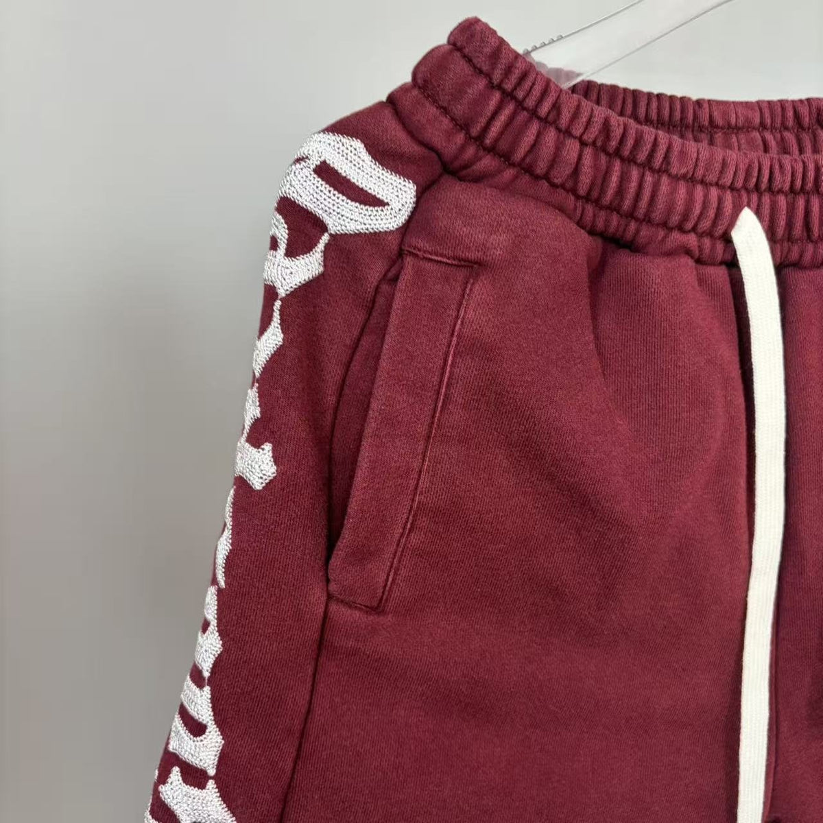Godspeed Burgundy Side-Letter Graphic Shorts — detail